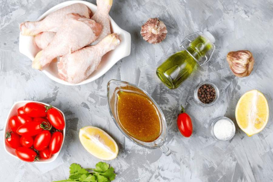 A dish of chicken dressing made with shredded chicken, breadcrumbs, onions, celery, and herbs, baked to golden perfection.